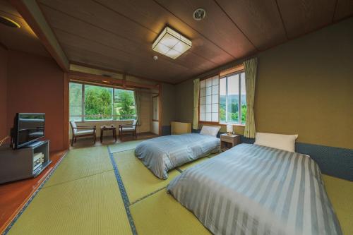 Imagen de la habitación del Hotel Onsen & Stay OAKHILL. Foto 18