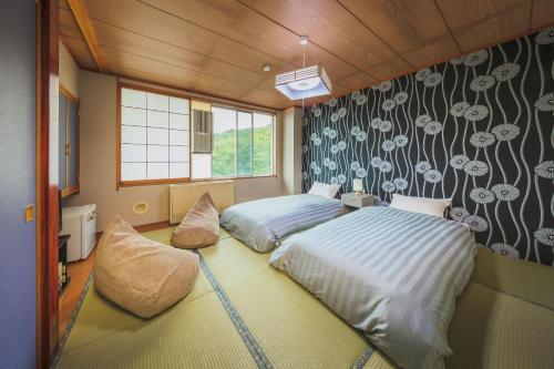 Imagen de la habitación del Hotel Onsen & Stay OAKHILL. Foto 19