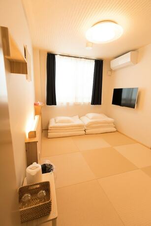 Imagen de la habitación del Hotel Onya Tachibana. Foto 14