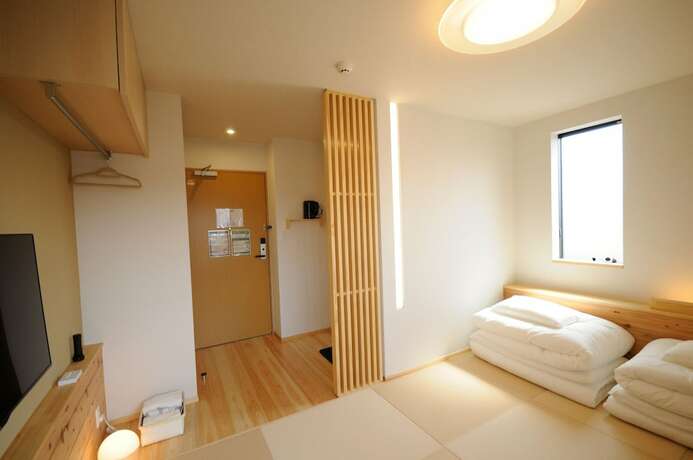 Imagen de la habitación del Hotel Onya Tachibana. Foto 16
