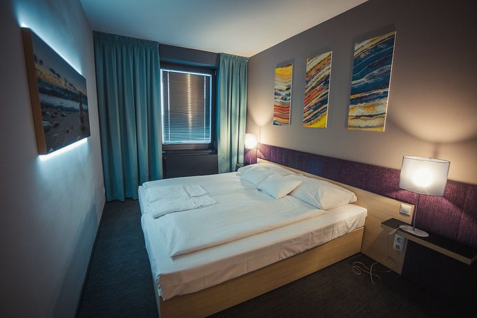 Imagen de la habitación del Hotel Onyx Luxury. Foto 15