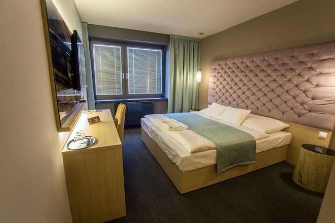 Imagen de la habitación del Hotel Onyx Luxury. Foto 17