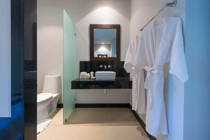 Imagen de la habitación del Hotel Onyx White Pearl Villa. Foto 9