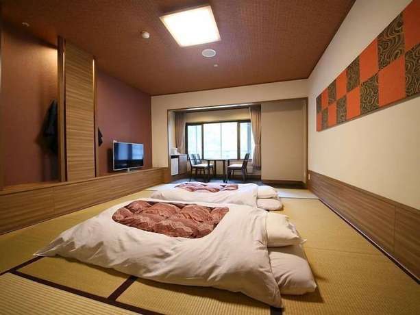 Imagen de la habitación del Hotel Ooedo Onsen Monogatari Minoh Kanko. Foto 16