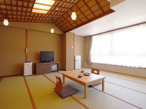 Imagen de la habitación del Hotel Ooedo Onsen Monogatari Premium Kinosaki. Foto 9