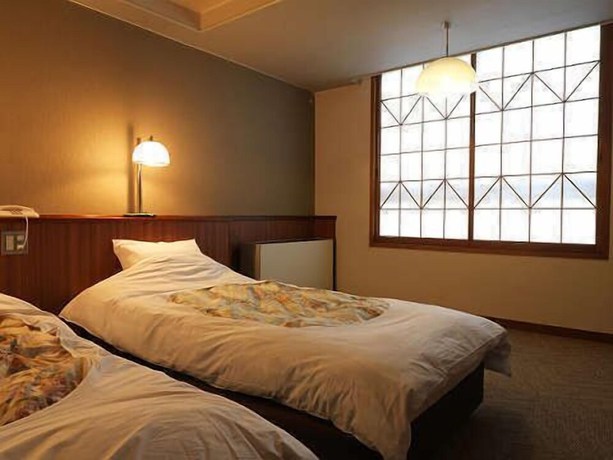 Imagen de la habitación del Hotel Ooedo Onsen Monogatari Premium Kinosaki. Foto 10