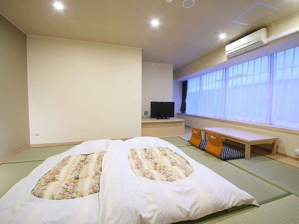 Imagen de la habitación del Hotel Ooedo Onsen Monogatari Premium Kinosaki. Foto 12