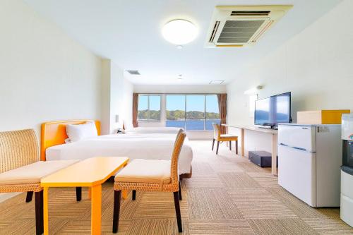 Imagen de la habitación del Hotel Ooedo-Onsen Monogatari Nanki Kushimoto. Foto 19