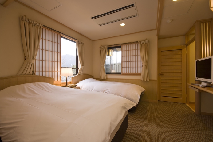 Imagen de la habitación del Hotel Ooike. Foto 10