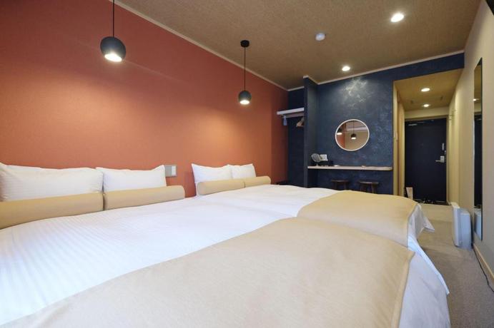 Imagen de la habitación del Hotel Ookini Hotels Dotonbori Apartment. Foto 2