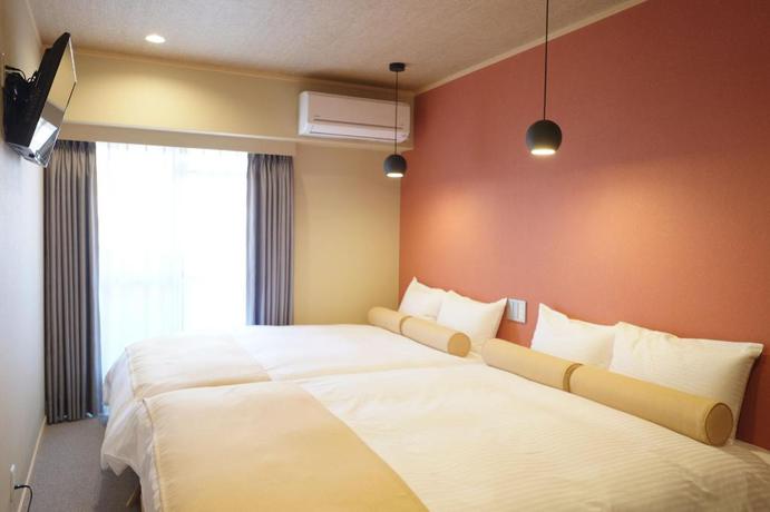 Imagen de la habitación del Hotel Ookini Hotels Dotonbori Apartment. Foto 3