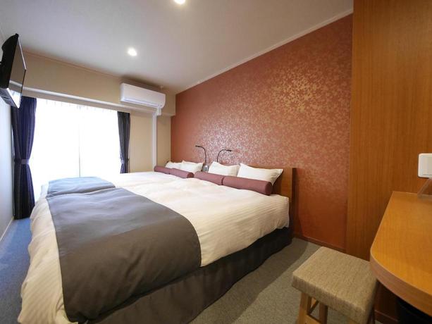 Imagen de la habitación del Hotel Ookini Hotels Dotonbori Apartment. Foto 4