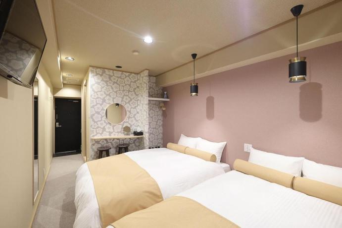 Imagen de la habitación del Hotel Ookini Hotels Dotonbori Apartment. Foto 6