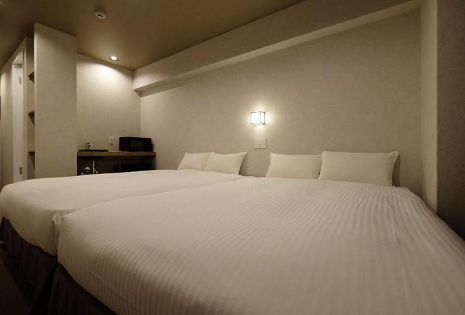 Imagen de la habitación del Hotel Ookini Hotels Dotonbori Apartment. Foto 15