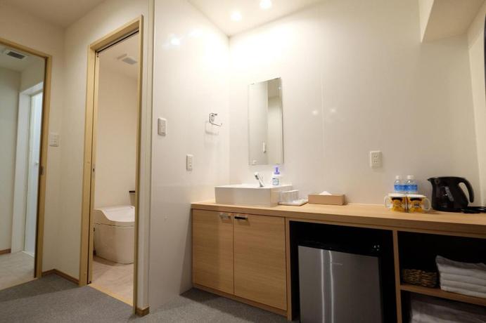 Imagen de la habitación del Hotel Ookini Hotels Dotonbori Apartment. Foto 19