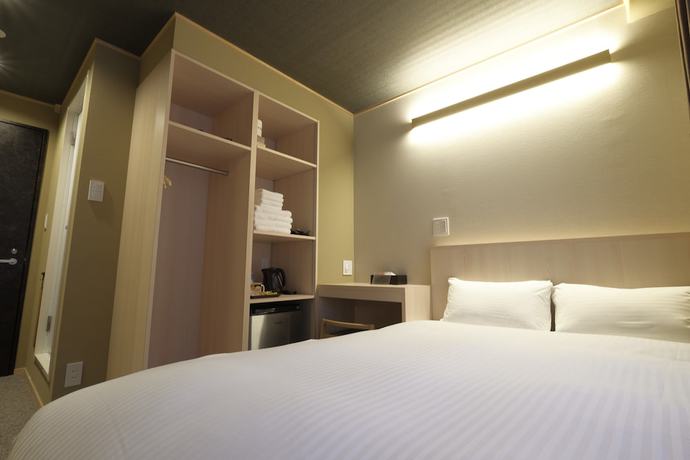 Imagen de la habitación del Hotel Ookini Hotels Osaka Castle Apartment. Foto 2