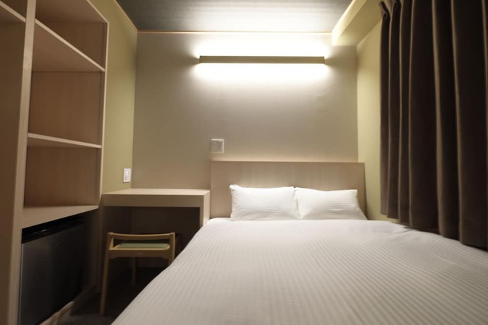 Imagen de la habitación del Hotel Ookini Hotels Osaka Castle Apartment. Foto 12