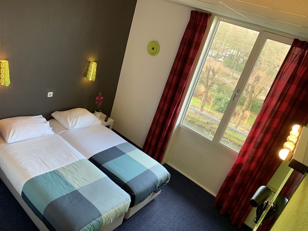 Imagen de la habitación del Hotel Oorsprongpark. Foto 11