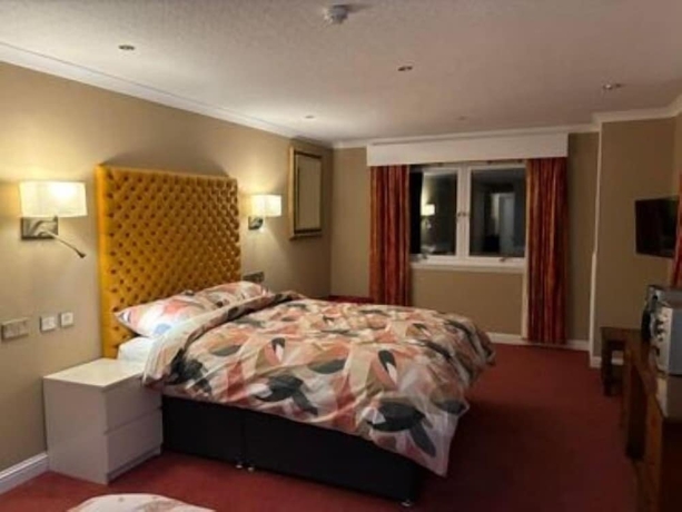 Imagen de la habitación del Hotel Ooters at The Mariner. Foto 10