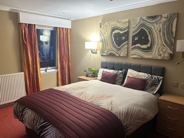 Imagen de la habitación del Hotel Ooters at The Mariner. Foto 11
