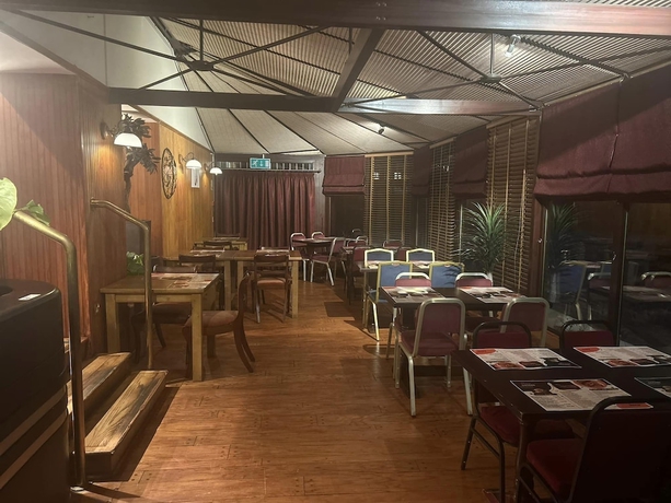 Imagen del bar/restaurante del Hotel Ooters at The Mariner. Foto 3