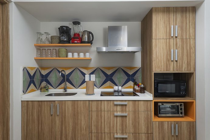 Imagen de la habitación del Hotel Opal Suites. Foto 4