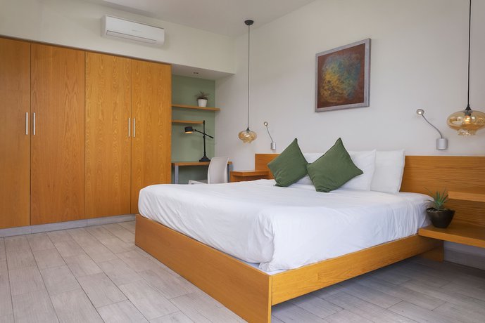 Imagen de la habitación del Hotel Opal Suites. Foto 6