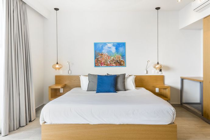 Imagen de la habitación del Hotel Opal Suites. Foto 15
