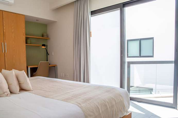 Imagen de la habitación del Hotel Opal Suites. Foto 17