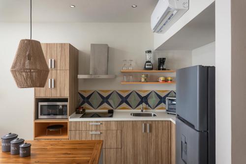 Imagen de la habitación del Hotel Opal Suites. Foto 21
