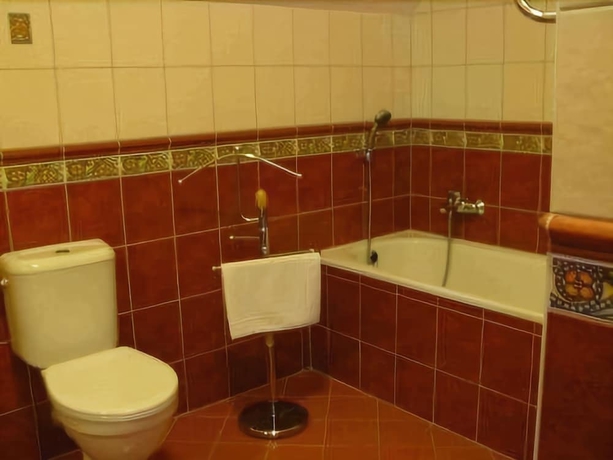 Imagen de la habitación del Hotel Opat. Foto 16