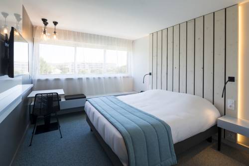 Imagen de la habitación del Hotel Opéralia Les Pins. Foto 4