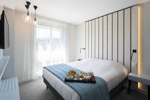 Imagen de la habitación del Hotel Opéralia Les Pins. Foto 8