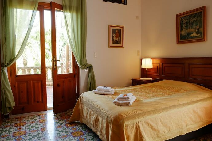 Imagen de la habitación del Hotel Open Sky Villa. Foto 15