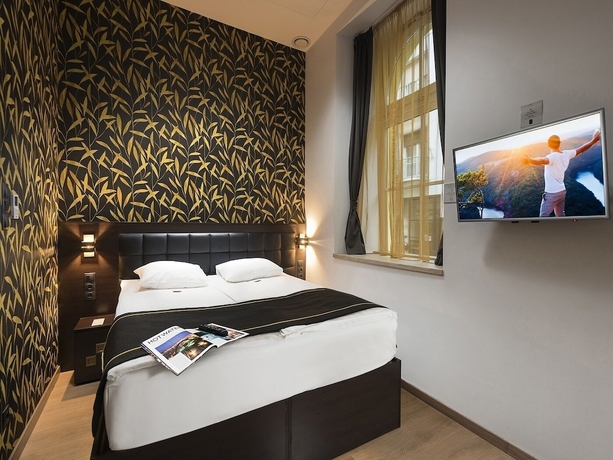 Imagen de la habitación del Hotel Opera Garden and Apartments. Foto 16