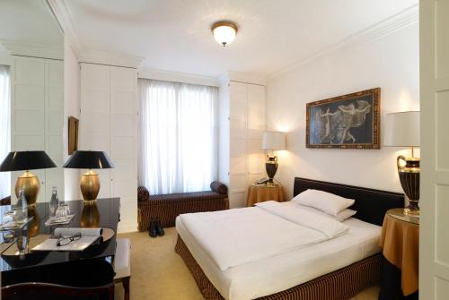 Imagen de la habitación del Hotel Opera, Munich. Foto 7