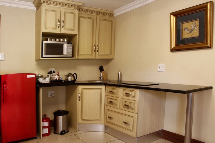 Imagen de la habitación del Hotel Opikopi Guest House. Foto 5