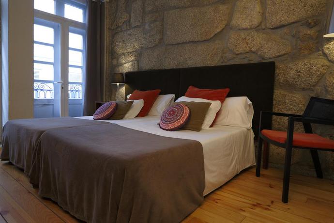 Imagen de la habitación del Hotel OportoHouse. Foto 5