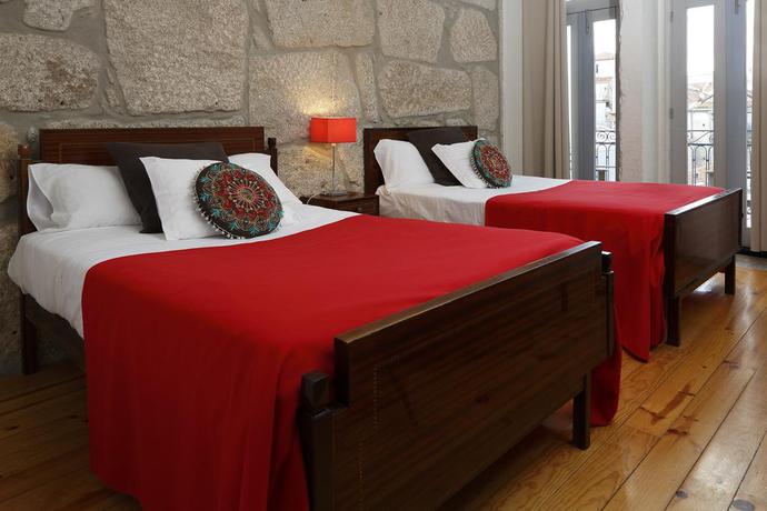 Imagen de la habitación del Hotel OportoHouse. Foto 6