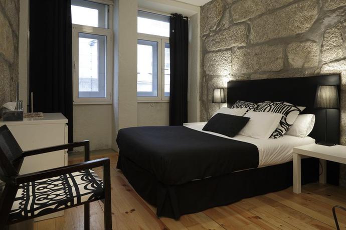 Imagen de la habitación del Hotel OportoHouse. Foto 12