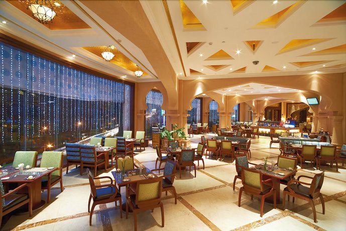 Imagen del bar/restaurante del Hotel Optics Vally Kingdom Plaza. Foto 5
