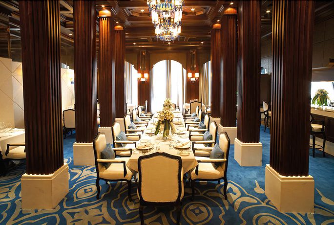 Imagen del bar/restaurante del Hotel Optics Vally Kingdom Plaza. Foto 7