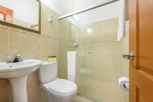 Imagen de la habitación del Hotel Optimum Pereira. Foto 2