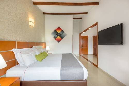 Imagen de la habitación del Hotel Optimum Pereira. Foto 5