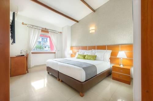 Imagen de la habitación del Hotel Optimum Pereira. Foto 6