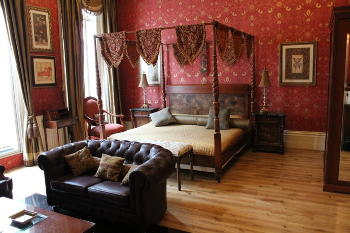 Imagen de la habitación del Hotel Opulence Boutique. Foto 12