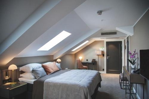 Imagen de la habitación del Hotel Opus Xvi. Foto 9