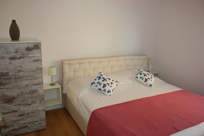 Imagen de la habitación del Hotel Orange Apartments. Foto 23