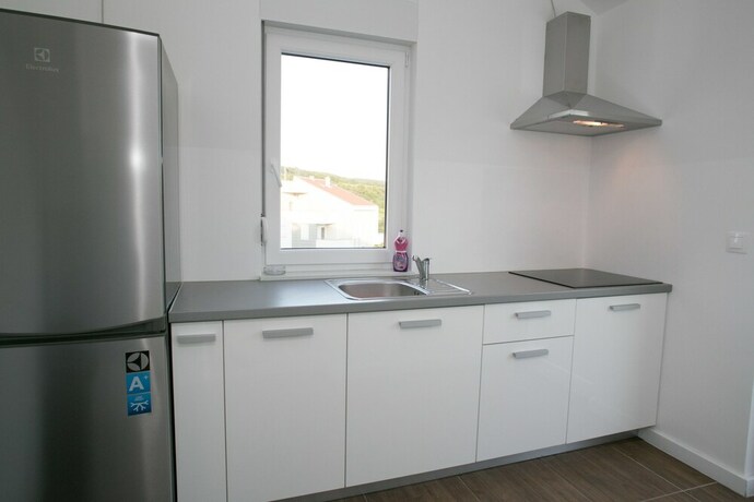 Imagen de la habitación del Hotel Orange Apartments. Foto 27