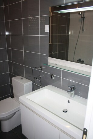 Imagen de la habitación del Hotel Orange Apartments. Foto 33
